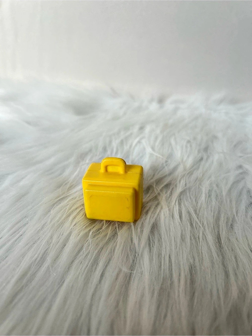 Vintage Fisher-Price retro Little People, yellow square luggage